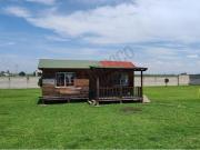 Terreno en venta con cabaña de madera, totalmente...