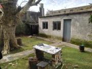 Terreno en venta con casa a reciclar