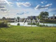 Terreno plano frente al lago en El Campanario Querétaro
