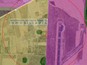 Terreno que colinda, convive con la malla ciclónica del...