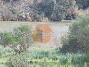TERRENO RUSTICO COM 1.520 M2 JUNTO AO RIO GUADIANA...