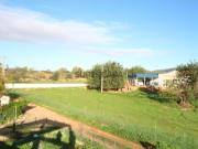 Terreno urbano com ruína para reconstrução em Estoi