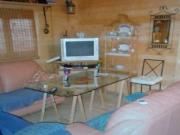 TERRENO URBANO CON CASA DE MADERA Y CASA DE CEMENTO