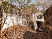 TERRRENO CON CONSTRUCCION EN FRACCIONAMIENTO CLUB DE...