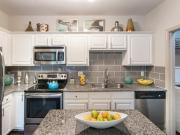 The Brownstones 1 Bedroom, 1 Bath 1 Car Garage The Brownstones 1 Bedroom, 1 Bath 1 Car Garage