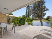 The Perfect Blend of Waterfront Serenity and Low...