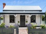 The picket fence dream a blue chip cottage renovated to...