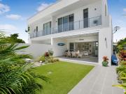 The White House on Broadwater Refined Riverside Living