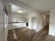 This bright, freshly renovated unit offers a modern and...