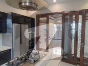 This Elegant One Kanal House Offers Spacious, Modern,...