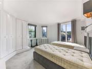 This exceptional three bedroom apartment with a vast...