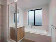 This modern residence is located in the highly sought...