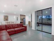 This modern residence is located in the highly sought...