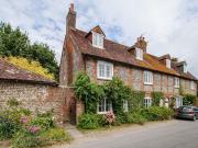 This quintessential country cottage, offering a...