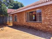 This secure and spacious 3 bedroom, 2 bathroom home is...
