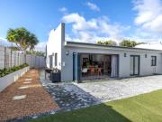 this stylish single story townhouse.