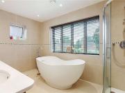 This versatile, modern, detached home includes a number...