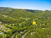 Three Bedroom Timber Home in a Forested Setting Offering...