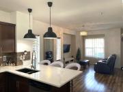 Three bedroom unit with 2.5 bath. End unit. Quartz...