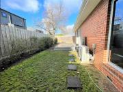 Three bedrooms and two bathrooms with a beautiful living...