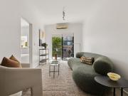 Tidy top floor apartment in village heart / start or invest