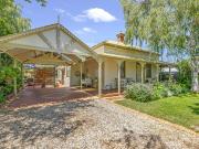 TIMELESS CHARM IN A PRIME LOCATION!