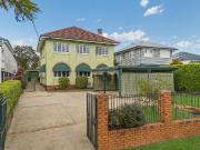 Timeless Charm, Warmth & Endless Potential Elevated...