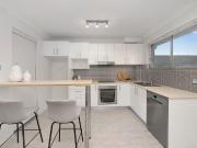 TOP FLOOR APARTMENT HIGHLY SOUGHT AFTER LOCATION