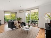 Top floor apartment with wraparound terrace and leafy...