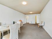 Top Floor Coastal Living with Distant Water Views