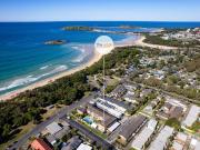 Top Floor Coastal Retreat at this Beachside Location.