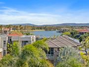 Top Floor Haven with Water & Mountain Vistas