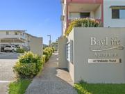 Top Floor Living with Pool Views & Bay Breezes