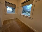 TOP FLOOR ONE BEDROOM PLUS SUNROOM/HOME OFFICE APARTMENT!