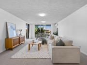 Top Floor Two Bedroom Apartment with Ocean Glimpses