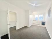 TOP FLOOR UNIT IN THE HEART OF THE CBD