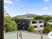 Top Level Apartment with High Ceilings, Stunning Views...