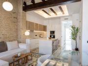 Tradición renovada: Frente al río y el centro