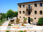 traditional guesthouse, a stone based decorated building...