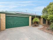 Tranquil Family Living in Lush Garden Setting