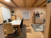 Traumhafte Bauparzelle mit gemütlichem Holzblockhaus