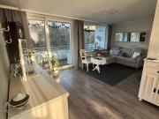 Traumhafte Eigentumswohnung mit Kamin, Balkon und Garten