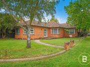 TRIPLE FRONTED BRICK VENEER ON CORNER BLOCK IN TOP LOCATION