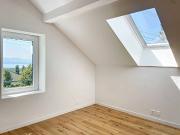 Triplex de 4.5 pièces grand jardin et vue partielle sur...