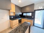 Triplex en alquiler de 4 ambientes con cochera San Martin