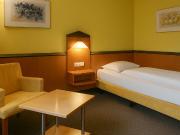 Twice the Comfort: Twin Room with Kitchenette in...
