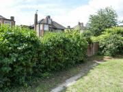 Twin bedroom with a window view, in Ealing Has a Room