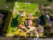 TWO AND A HALF ACRES IN TOWN