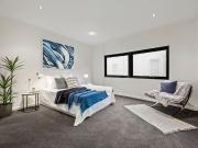Two Level Beachside Property with bay glimpses