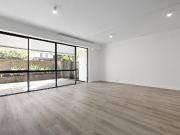 Two Level Townhouse with Private Courtyard and Two Car...